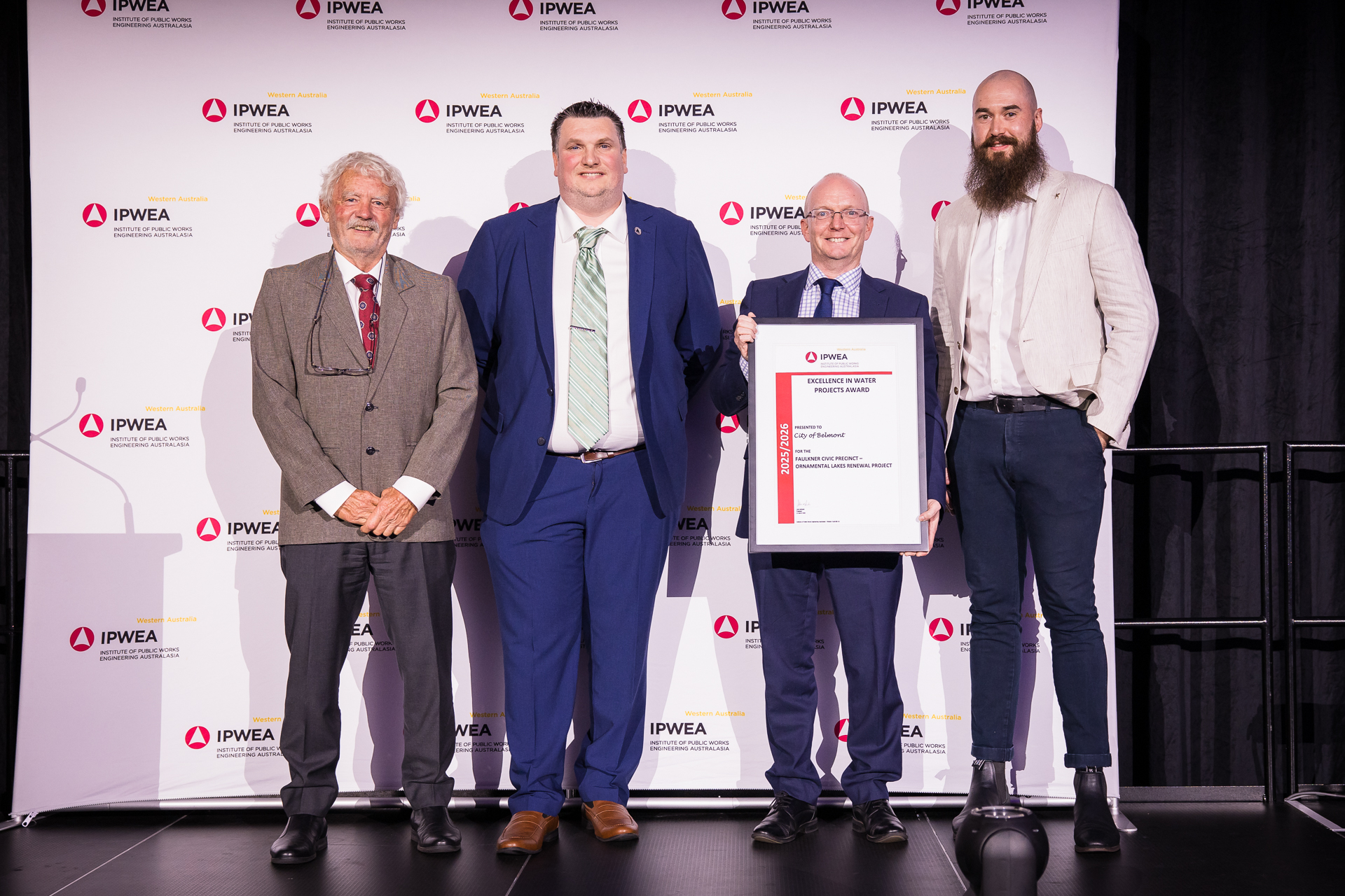 City of Belmont staff on stage receiving the IPWEA WA award